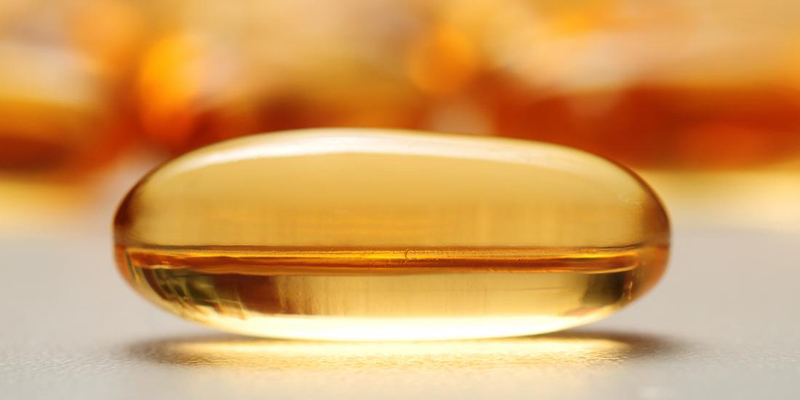 What dictates how vitamin E supplements affect cancer risk?